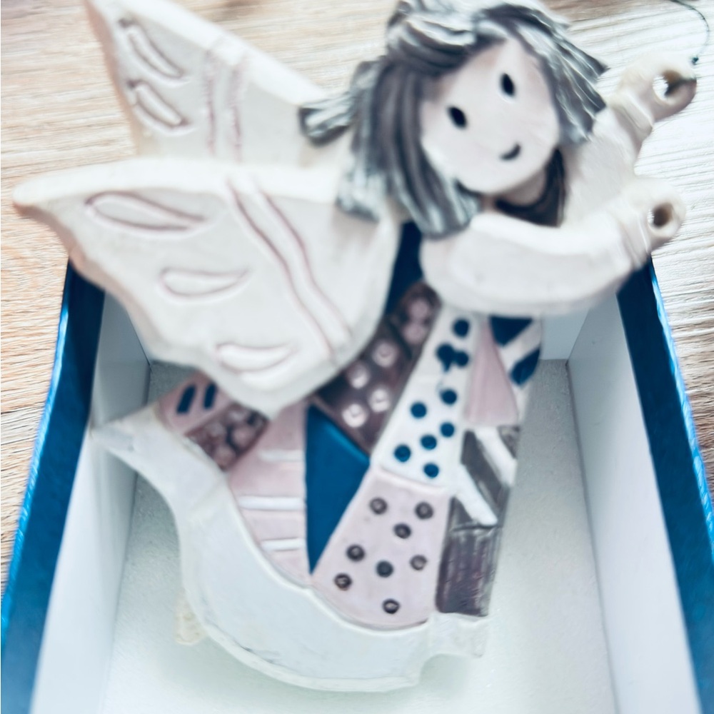 Handcrafted Angel Figurine with Blue and Pink Accents